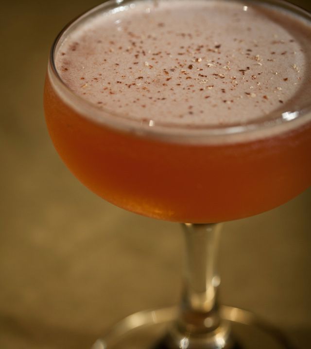 Forty Four, the new lounge opened by the Cocktail Collective at the Royalton Hotel, specializes in a fall foliage colored cocktail named The Stone Place, which is served, appropriately, with a fine dusting of nutmeg.One orange wedge1/2 oz. Organic Fresh Lemon Juice3/4 oz. House made pomegranate grenadine2 oz. Appleton Estate ReserveDust of fresh NutmegShake with orange wedge and ice, and strain into a chilled coupe dust with nutmeg.